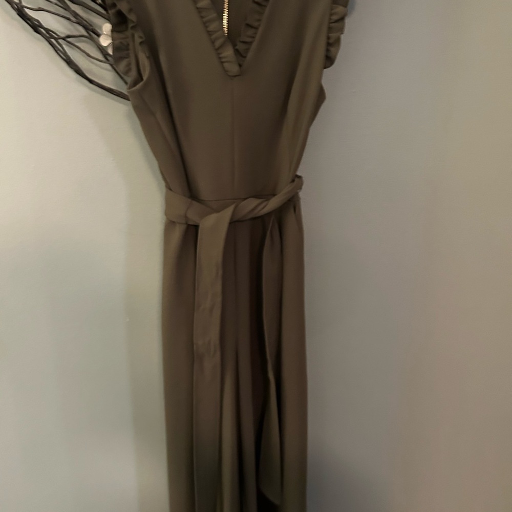 Calvin Klein Jumpsuit (w/pockets), cropped length. New w/out tags, never worn.